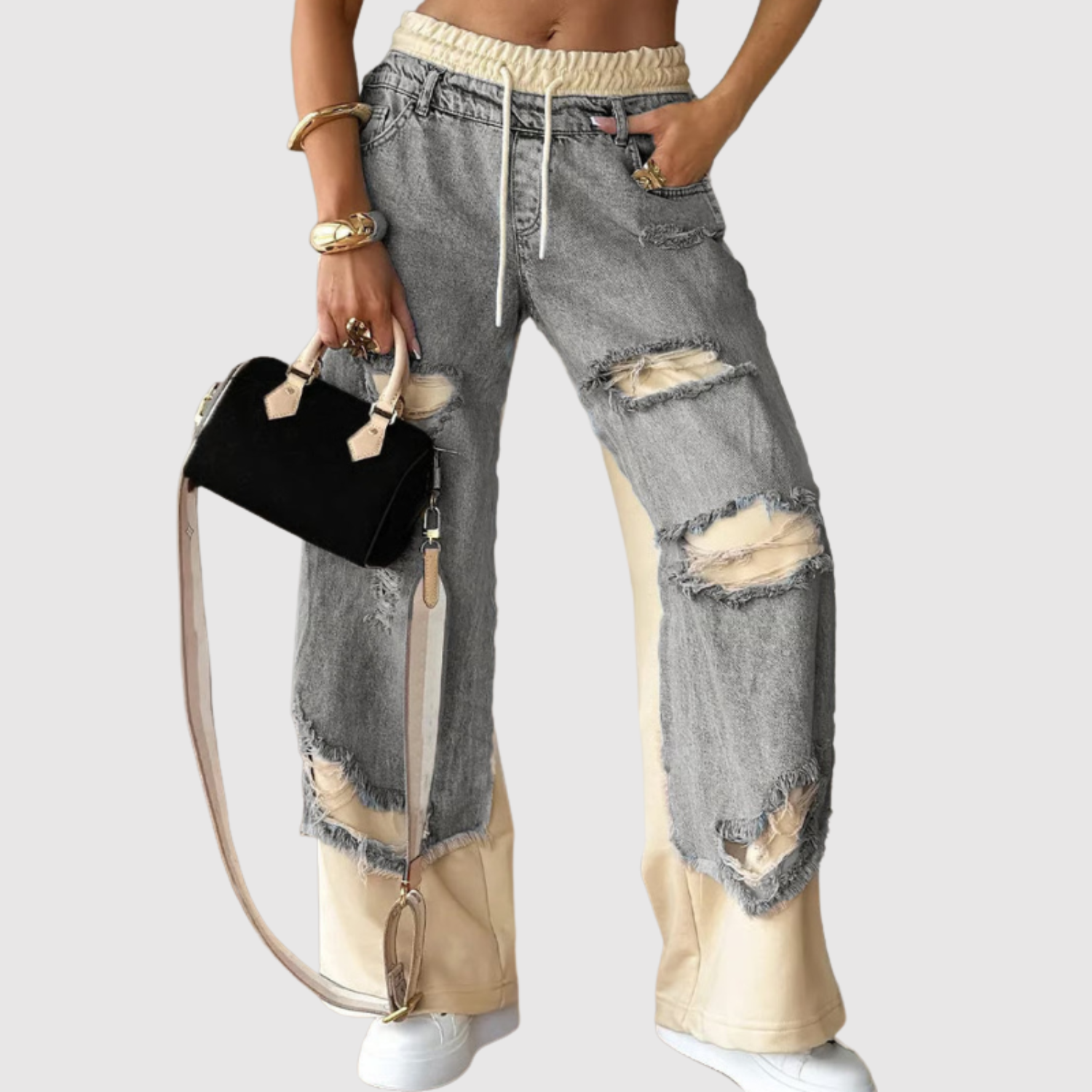 Kira – Dżinsy z przetarciami i modnymi detalami